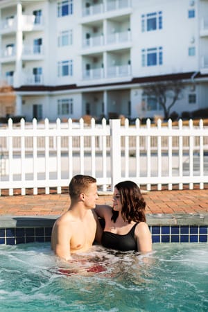 Couple  in hot tub at Inn at Bay Harbor 