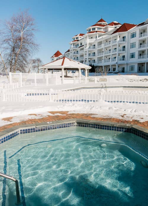 Hot tub surrounded by snow, Inn at Bay Harbor