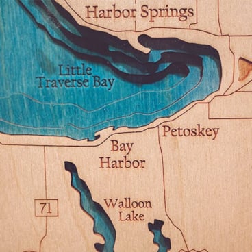 Centrally located to Boyne City, Harbor Springs, Petoskey, and Charlevoix, these towns offer unique shops, and local color.