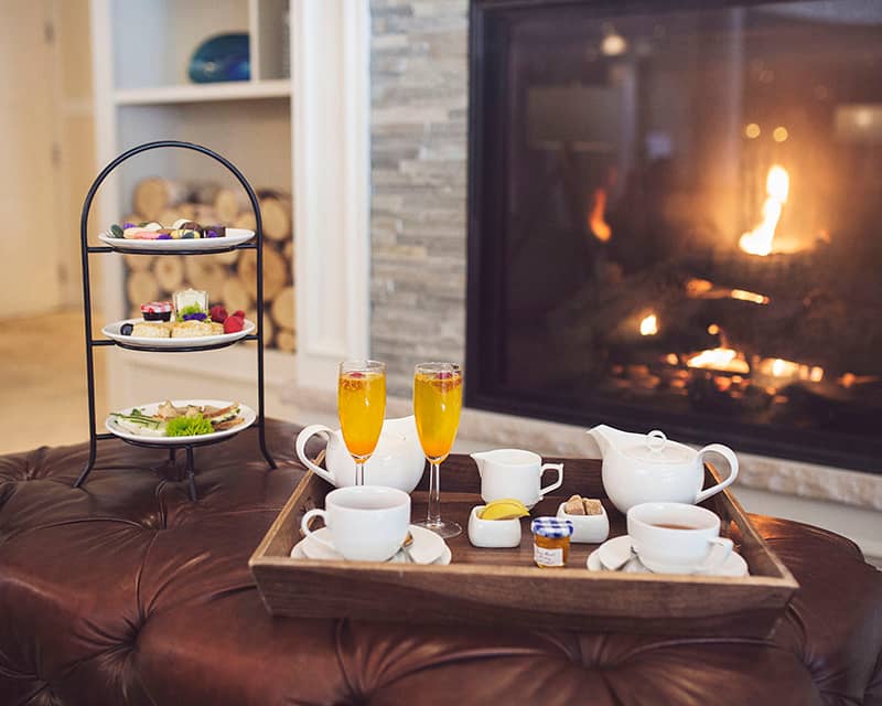 Afternoon Tea at fireplace in Inn at Bay Harbor lobby
