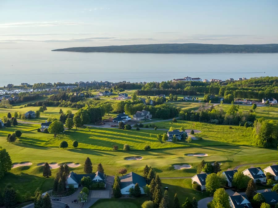 Aerial view of Crooked Tree Golf Club, Bay Harbor and Lake Michigan