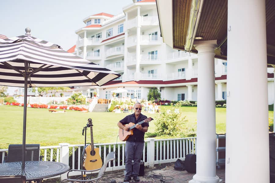Live music, guitarist, outdoor Cabana Bar in summer, Inn at Bay Harbor