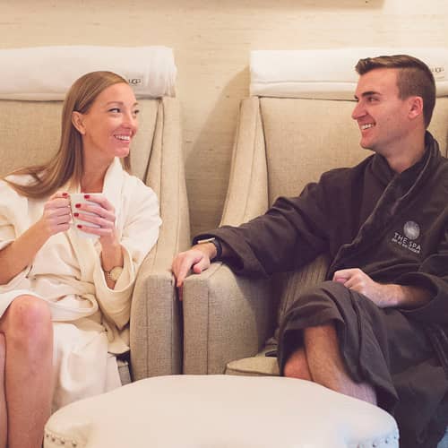 Woman and man enjoy relaxing at The Spa